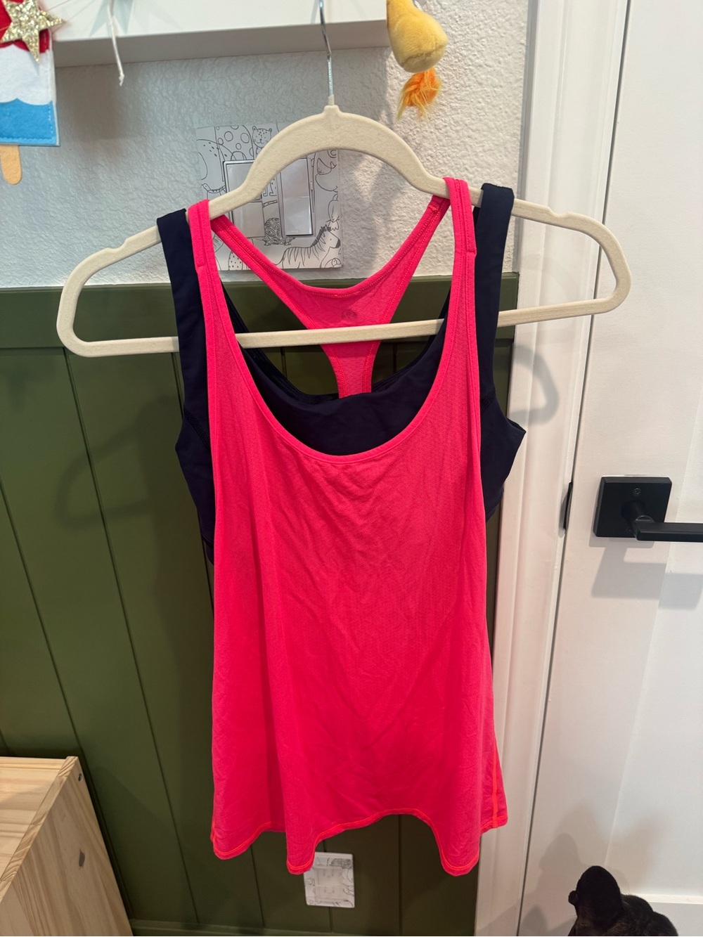 lululemon athletica Racerback Tank in Neon Coral with navy blue sports bra